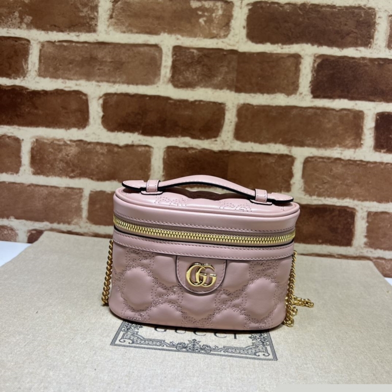 G*u*i cosmetic bags